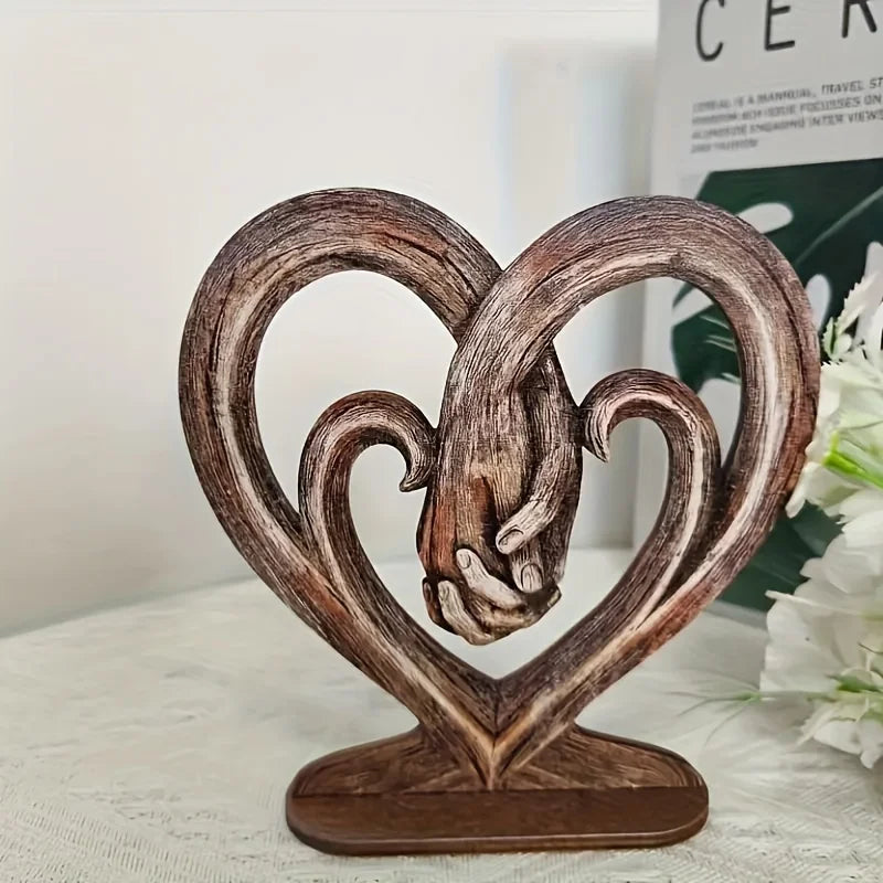 Heart Holding Hands Art Sculpture